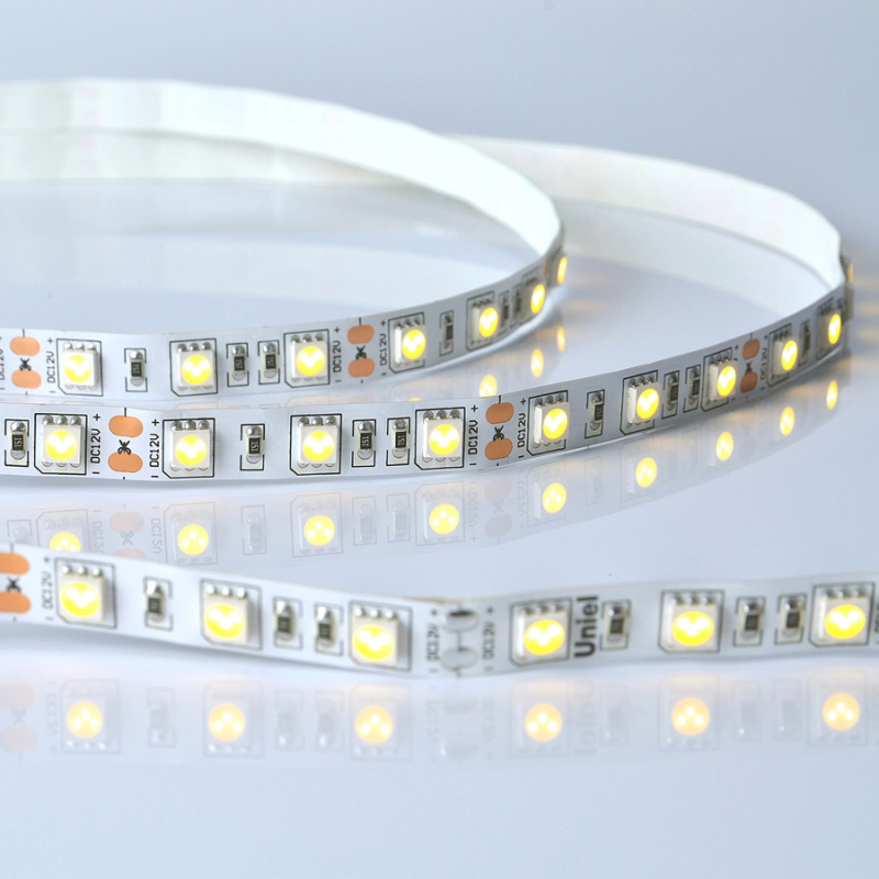 Светодиодная лента Uniel ULS-M25-5050-60LED/m-10mm-IP20-DC12V-14,4W/m-5M-3000K PROFI катушка в герметичной упаковке в Санкт-Петербурге