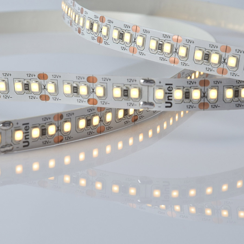 Светодиодная лента Uniel ULS-M16-2835-180LED/m-10mm-IP20-DC12V-17W/m-5M-3000K PROFI катушка в герметичной упаковке в Санкт-Петербурге