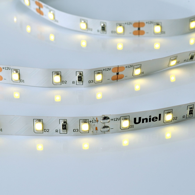 Светодиодная лента Uniel ULS-M11-2835-60LED/m-8mm-IP20-DC12V-4,8W/m-4M-4000K PROFI катушка в герметичной упаковке в Санкт-Петербурге