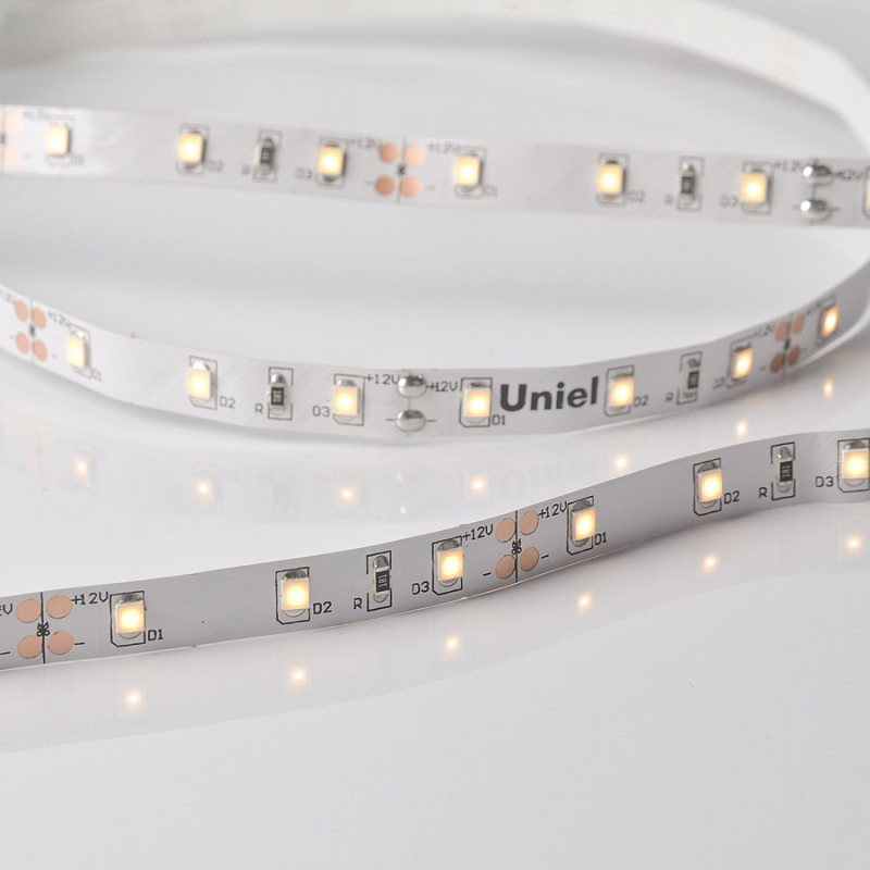 Светодиодная лента Uniel ULS-M11-2835-60LED/m-8mm-IP20-DC12V-4,8W/m-5M-3000K PROFI катушка в герметичной упаковке в Санкт-Петербурге